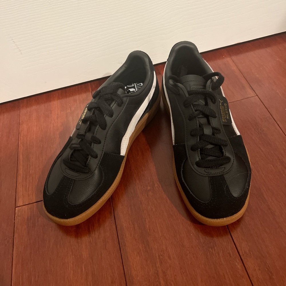 Black and white Puma sneakers
